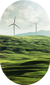 Landschaft mit Windrädern – nachhaltig fahren und tanken mit Ladesäulen von ALB